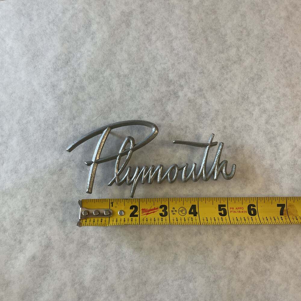 Plymouth De Luxe Vintage Emblem